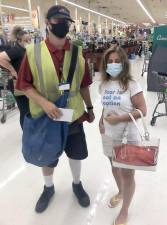 Price Chopper employee Barron with Gail Stellato. The young man, whose job is to collect carts, found Stellato’s purse in a cart and returned it to the store’s customer service department, where she later retrieved it. Provided photo.