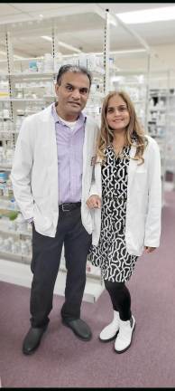 Pharmacist offers help getting flu and Covid vaccines
