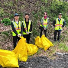 Chester Academy Key Club students help clean up a portion of Arcadia Road.