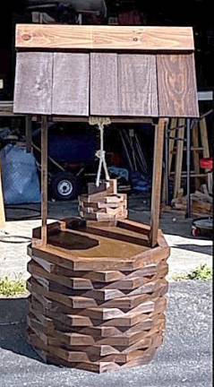 Hand-made wishing wells are among John Smykla’s top sellers. Provided photo.