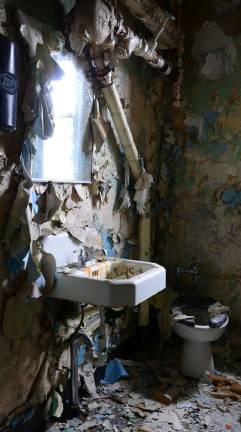 Camp LaGuardia at the crossroads A ruined bathroom in the Infirmary building is framed as an artistic portrait of abandonment and decay. Courtesy of Robert Yasinsac / Hudson Valley Ruins.