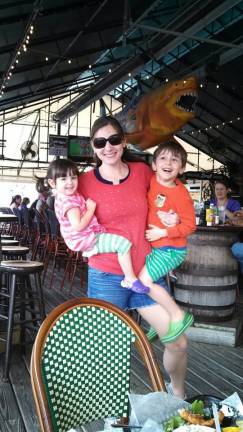 Mommy & Me Contest Emily Collado of Goshen with her children David and Betty. "My Happy Handful. I have been a stay-at-home mom for the past five years to David and Betty. It has been a non-stop roller coaster ride; lots of ups and downs, twists and turns, and they often throw me for a loop."