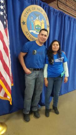 A movement grows to protect vulnerable immigrants Jonathan Jimenez and Berta Ramos, Mexican immigrants living in Goshen, attended CVH (Community Voices Heard) rally at the Newburg Armory Unity Center (Photo by Frances Ruth Harris)