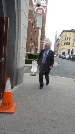 Photo by Frances Ruth Harris Chester Town Supervisor Alex Jamieson enters the Albany County Courthouse on Tuesday, July 17 for a status conference on the charges against him.