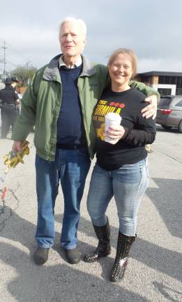 Sandy Nagler with an energetic helper (Photo by Frances Ruth Harris)