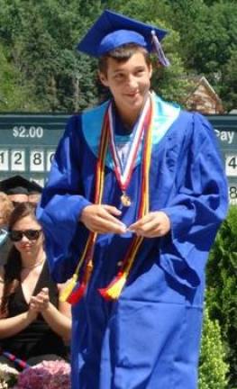 Meet Goshen's Class of 2012 Honor Graduate Chase Bouchard returns to his seat after delivering his talk, "Thank You," to his classmates, friends and family.