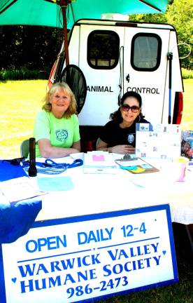 At the Warwick Valley Humane Society booth: Celia Ross, vice president (left), and Suzy Barron, president (Photo by Ed Bailey)