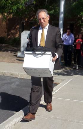 Horse deaths trial wraps up Jeanne Ryan’s attorney, Michael Sussman, walks away from the courthouse on the last day of the bench trial (Photo by Frances Ruth Harris)