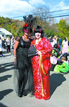 More than 400 turn out for Halloween bash Masquerade in Black AnnMarie Woods and Red Geisha Carol Ceballos, both of Chester