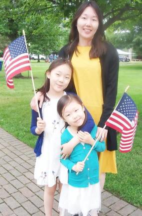 Young Lee and her children, Erin, 9, and Evelyn, 5, of Goshen, were happy to come to the parade. Erin and Evelyn thought this was “a good parade” and they especially liked seeing the fire engines.