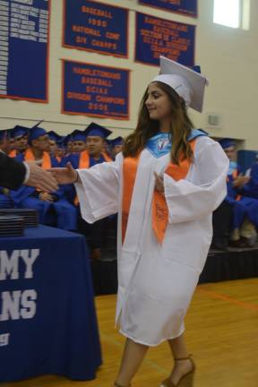 Megan Heller receives her diploma.