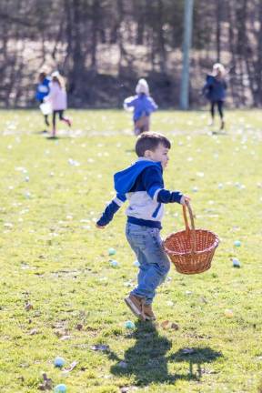Kids raced to collect Easter eggs at the PBA annual Easter Egg Hunt at Chester Commons Park. Photo by Sammie Finch