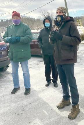 Pictured from left to right are Rich Strobel, the Respect Life coordinator for Sacred Heart and St. Anastasia churches, the Rev. David Rider, the pastor of Sacred Heart Church in Monroe, and Assemblyman Colin Schmitt at the March for Life held Jan. 29 at the Park and Ride in the Village of Monroe.