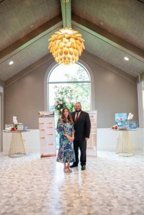 – Rabbi Pesach and Chana Burston, directors of Chabad of Orange County, in the lobby of the new Chabad Center for Jewish Life.