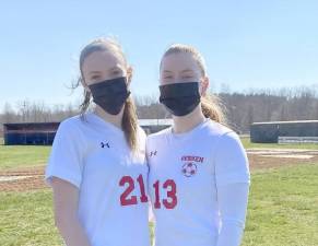 From left, junior Jillian Brosnan and Emma Wapshare. Holly Bachorik is not present in photo