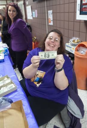 'Swish for Mush' honors friend lost to domestic violence Gina Sleight with a $100 bill profit (Photo by Frances Ruth Harris)