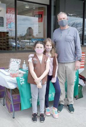 Chester Girl Scouts Olivia and September with William Kelly outside of ShopRite last Saturday.