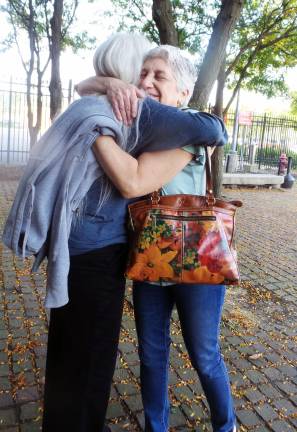 Cheryl James and Beverly Sharpe hug outside the courthouse before the sentencing (Photo by Frances Ruth Harris)