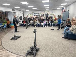 The student got to see how different types of robots are employed by local law enforcement.