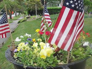 South Street resident Mark Gargiulo organized the effort to display American flags on both sides of the streets on Memorial Day and the Fourth of July to honor veterans and thank essential workers who toil during the COVID-19 virus. Photos by Geri Corey.
