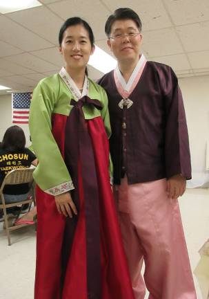 Korean Cultural Night dazzles the community Pastor Hong and wife Gyonghui Kim (Photo by Ginny Privitar)