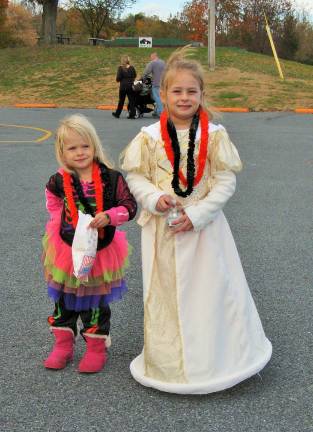 Chester celebrates the haunting season Charlotte, 3, and Emma Neuhaus, 5, of Chester (Photo by Ginny Privitar)