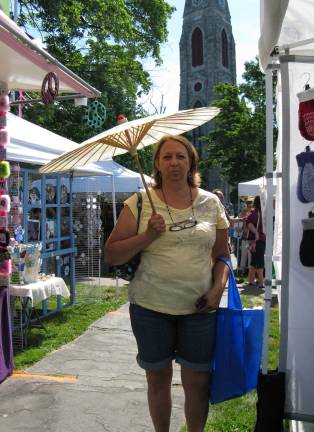 Scenes from Great American Weekend Pamela Mann of Middletown wisely brought a parasol.