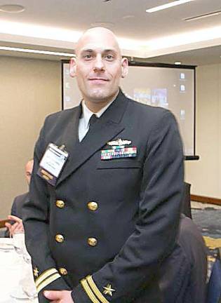 Navy Lt. Laurence Clemente receives the Surface Navy Association’s leadership award Lt. Laurence Clemente