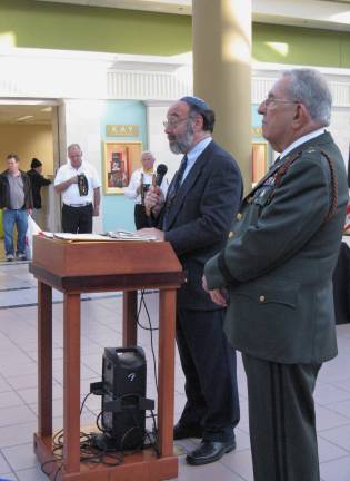 70 years ago, in a dark and snowy wood Rabbi Gary Loeb of Monroe Temple of Liberal Judaism offered prayers. (Photo by Ginny Privitar)