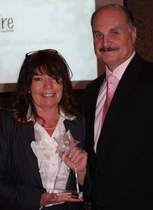 Inspire honors its ‘Shining Stars’ Lynn Allen Cione is pictured with Inspire’s President and CEO, Marcel Martino (Photo provided)
