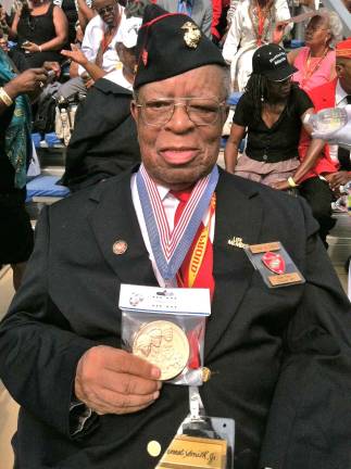Ernest A. Smith Jr., Congressional Gold Medal honoree, dies at age 91 Ernest Smith at last year with his Congressional Gold Medal at the awards ceremony. (Photo courtesy of the Smith family)