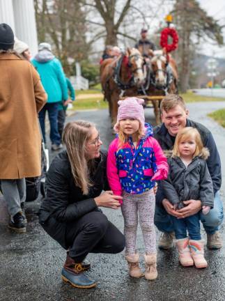 Carly, Chris, Maggie and Bree Nedwetzky stop for a picture in front of the horses.