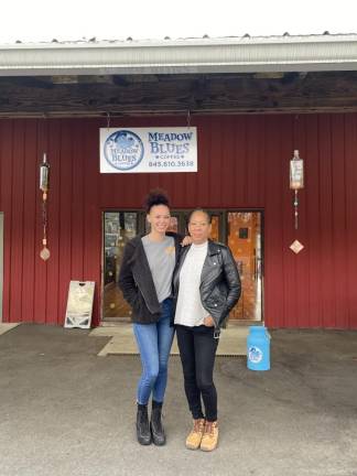 Gina Stafford, right, and her daughter Simone in front of Meadow Blues Coffee shop in Chester. Photo by Hanna Wickes.