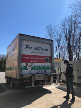 A truck of fresh meat from Pat LaFrieda Meat Purveyors arrives at Mohawk House.