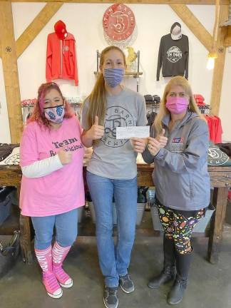 Pictured from left to right are: Nicole Greco, Making Strides captain for Team Boobalicious (Chester); Lauren VanPamelen, owner of the Tin Barn Brewing (Chester); and Kristi Greco, Community Development manager for the American Cancer Society (Chester). Provided photo.