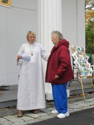 A blessing for Princess Buttercup, and other bright creatures Sue Odell from Sugar Loaf sought blessings for her sister’s pets and for Equine Rescue in Pine Bush (Photo by Ginny Privitar)