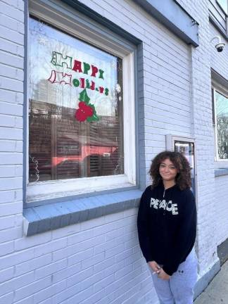 Chester Academy students decorate local shops with holiday scenes