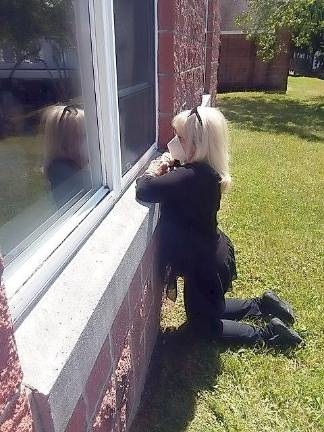 Goshen. The will and the ways of staying together Adrienne Crawford “visits” with her 95-year-old mother, Joan Crawford, at Glen Arden Life Care Center. Provided photo.