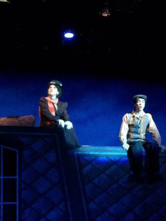 The perfect nanny at Cherry Tree Lane Bert and Mary Poppins enjoy the best view of the city, the view of the "sweeps," high above the London streets.