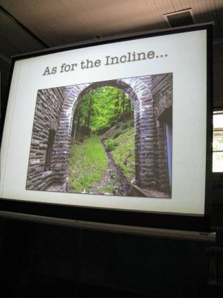 Alex talks history A stone arch remains from the incline railway going up to Arden House.  It fell into disuse after a roadway was built.