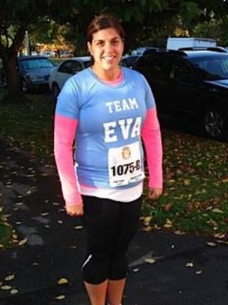 Runners rack up miles at first-ever marathon Alissa Pirraglia, representing Goshen’s Team Eva, which ran for Rett Syndrome. Pirraglia said more than 80 entries were for Team Eva, including five full marathon racers and 26 teams. They raised $22 thousand from this race for their charity. (Photo by Geri Corey)