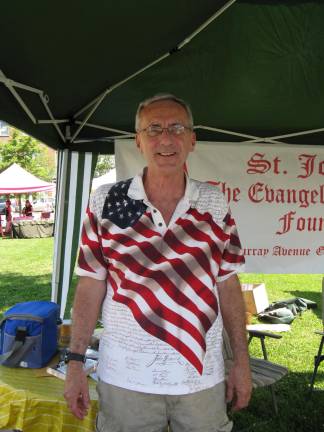 Scenes from Great American Weekend George Schust of Chester, member of St. John's in Goshen, wore his flag shirt.