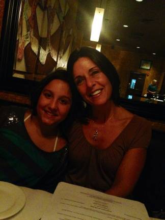 Mommy & Me Contest Caren Johnson and daughter Lauren Scarzafava of Goshen. "To the moon and back. We just love to be together. Out to dinner at our favorite place."