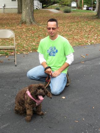 A blessing for Princess Buttercup, and other bright creatures Steve Feneck with Rusty, a cocker spaniel up for adoption at the Warwick Humane Society (Photo by Ginny Privitar)