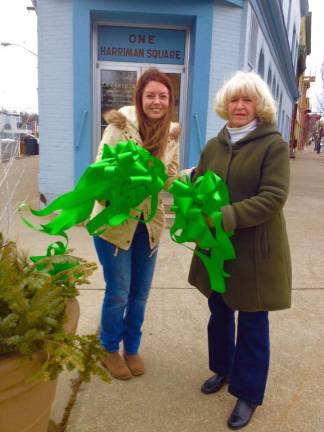 Goshen in Bloom needs your help Goshen in Bloom President Molly O'Donnell and volunteer Judy Green decorate planters around Goshen with ribbons for St. Patrick's Day (Goshen in Bloom Facebook photo)