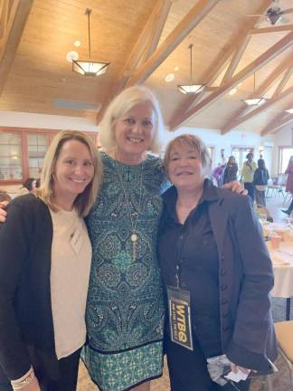 Goshen Chamber of Commerce’s Heather Larsen with event moderator Regina Clark, CSP, and Round table host Taylor Sterling from WTBQ Radio.