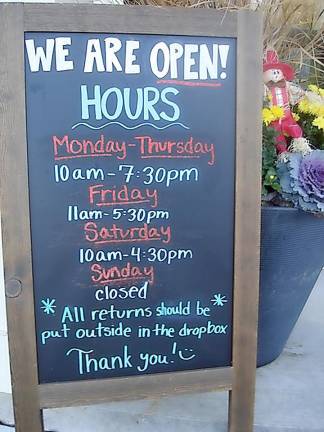 Goshen Public Library’s operating hours are posted on an outside sign. Note that it doesn’t open until 11:00 a.m. on Friday and closes two hours earlier. The Library is closed on Sunday but open until 4:30 p.m. on Saturday.