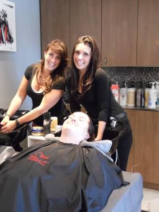 Salon Lucere strives to offer clients 'an experience' Erin Stamp (front) with stylists Caitlin Dolan of Rock Tavern (right) and Dawn Vantilburg of Chester. (Photo by Ginny Privitar)