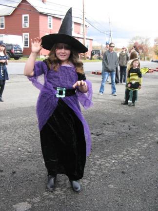 Chester celebrates the haunting season Skyla Castalonia, 7, from Chester, needed to hold on to her hat (Photo by Ginny Privitar)