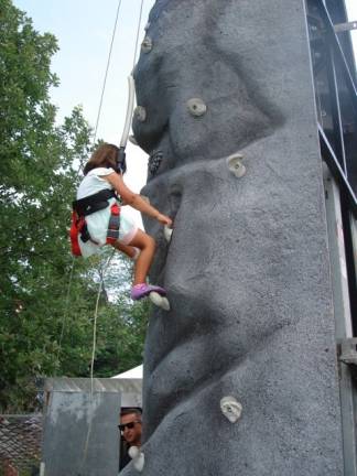 Patriotic fun abounds at Great American Weekend Scarlett Hayden, 4, who lives in Goshen, was brave enough to climb the wall. This is her first attempt, but she’s going to try doing it again next year. Keep trying, Scarlett!